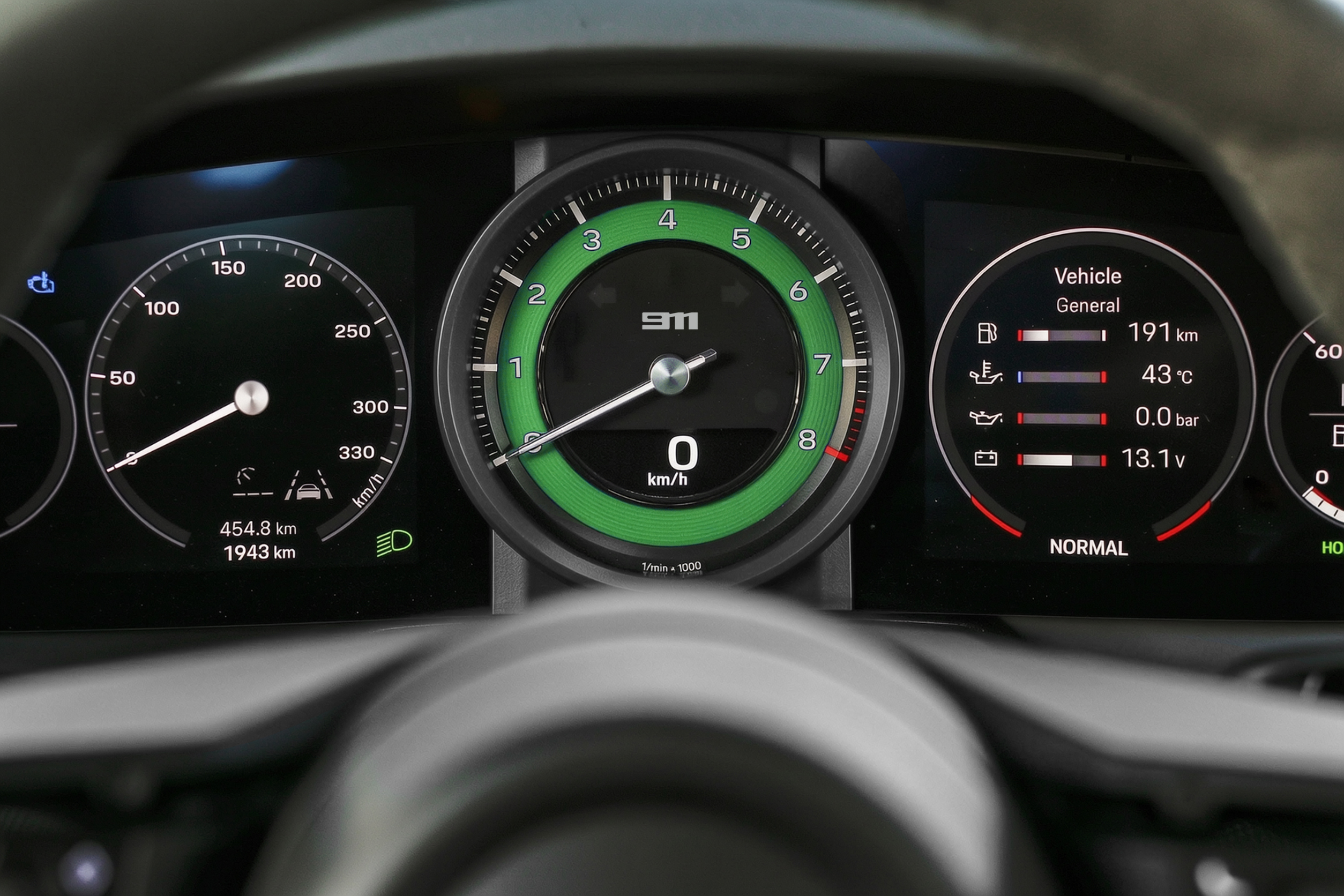 992-tachometer-pythhon-green-911-logo